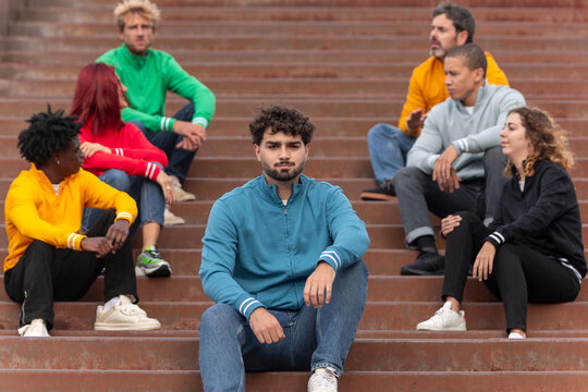 Diverse group wearing colorful full zip sweatshirts