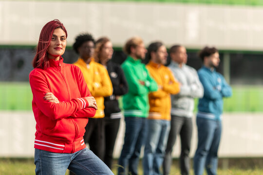 Group in colorful full zip sweatshirts outdoors