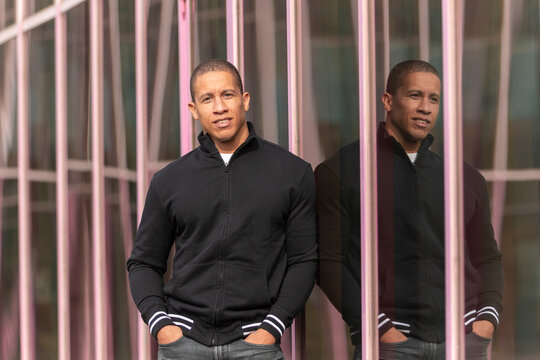 Man wearing stylish full zip sweatshirt outdoors