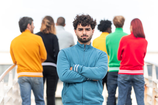 Group wearing colorful full zip sweatshirts