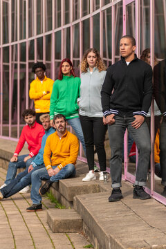 Group in colorful full zip sweatshirts outdoors