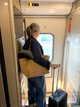 Mature traveler on a scenic train journey