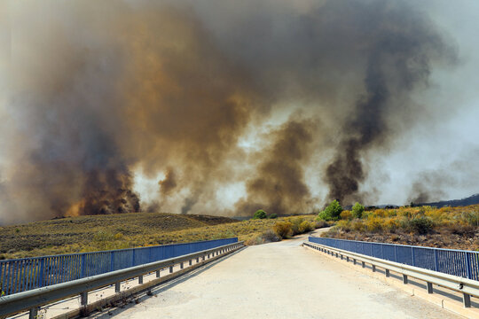 A devastating wildfire fueled by an intense heatwave burns through dry vegetation in Los Gallardos in Almeria province southern Spain destroying homes and threatening communities on July 10 2026.