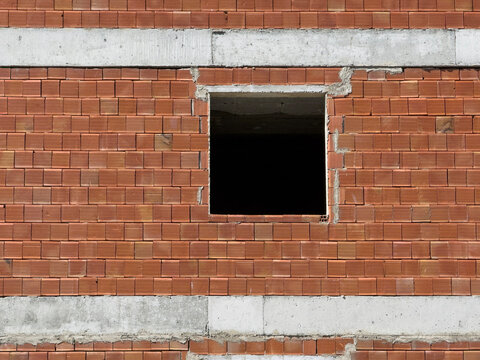 Brick wall with concrete beam and window opening detail