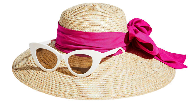 Wide-brimmed straw hat with a bright pink ribbon and white cat-eye sunglasses, isolated on transparent background
