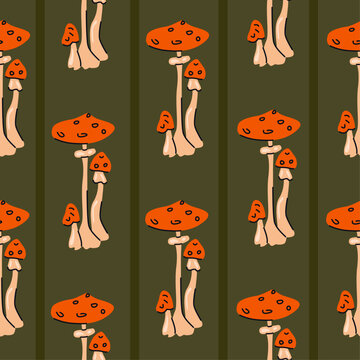 Autumn seamless pattern with woodland mushrooms on green striped background. Forest vector design for fabric, wrapping paper, wallpaper and textile.