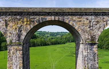 Historic aqueduct and railway viaduct designed by Thomas Telford, featuring canal engineering for the Llangollen Canal in Shropshire, UK. © steheap