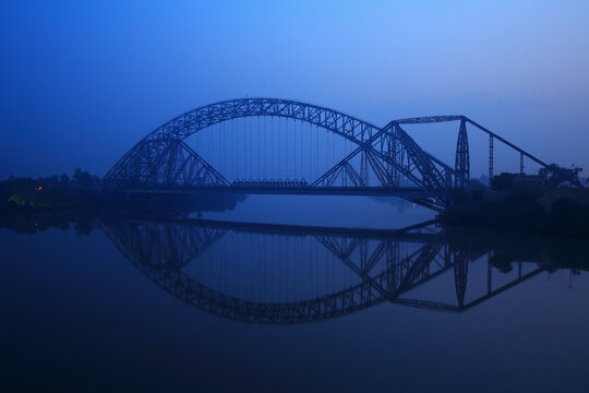 The Lansdowne Bridge, also known as Lens Down Bridge, is a historic cantilever bridge over the Indus River in Sukkur, Pakistan, inaugurated in 1889 and currently undergoing restoration.