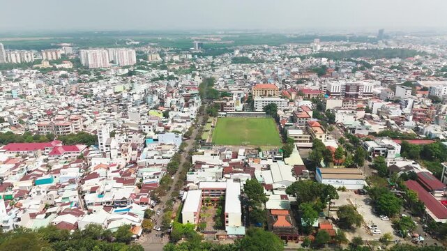 Bien Hoa City, Dong Nai, Vietnam &ndash; 4K aerial drone footage of Dong Nai River, city skyline, riverside neighborhoods, riverside houses, bridge and urban landscape