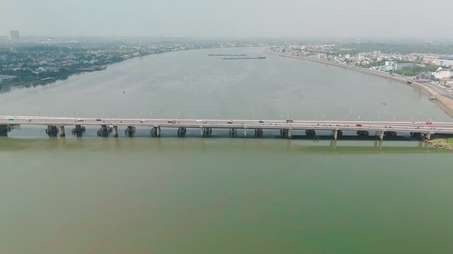 Bien Hoa City, Dong Nai, Vietnam &ndash; 4K aerial drone footage of Dong Nai River, city skyline, riverside neighborhoods, riverside houses, bridge and urban landscape