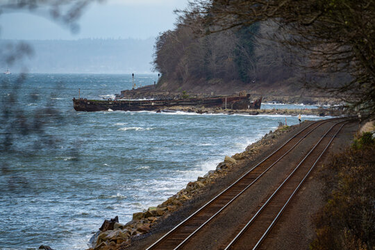 Shipwreck and Railroad Tracks Along Shoreline Near Picnic Point Washington