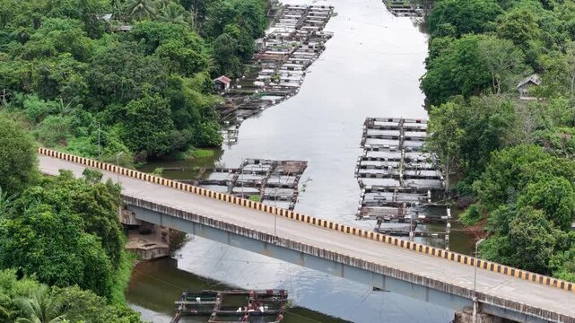 Aerial view of fish ponds in the Riam Kanan reservoir waters area