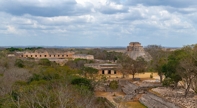 Cityscape of Mayan archaeological site of Uxmal with the Magician Pyramid and Quarter of the Nuns, Yucatan, Mexico.