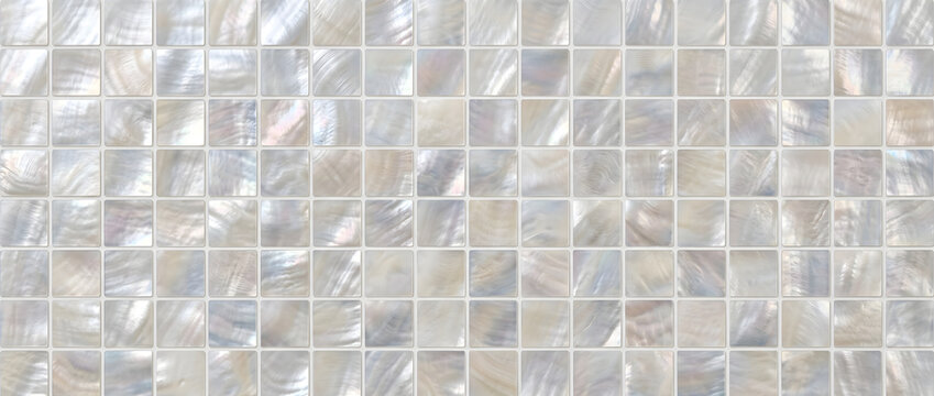 Iridescent mother of pearl mosaic tile texture with luminous square shell pattern creating a seamless luxury decorative background