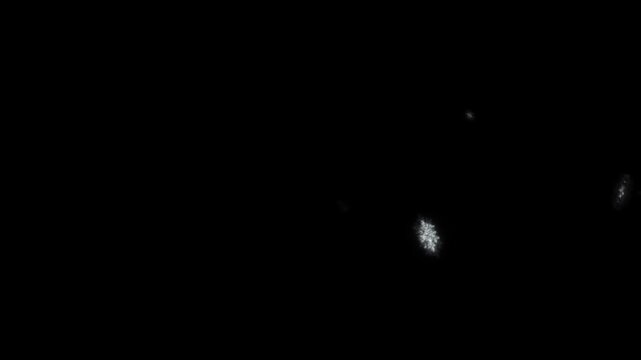 Abstract glowing particles floating and swirling in dark black space. Futuristic digital science background.