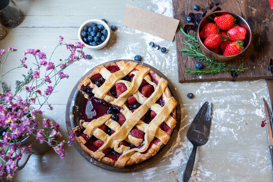 Rustic berry pie on table