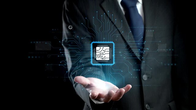 A businessman presents a microprocessor chip in his hand, surrounded by digital circuits, symbolizing the fusion of technology and innovation in modern industry. Qubit