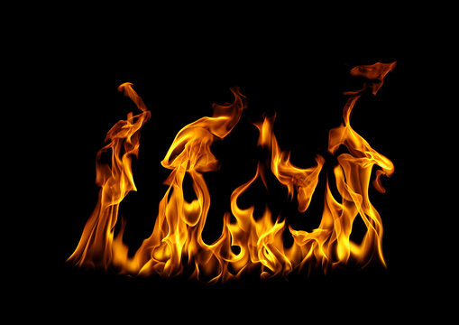 Realistic fire flames isolated on black background with blazing orange fire, heat, burning energy, inferno, and flame texture. Ideal for design, overlays, special effects, and safety concepts.