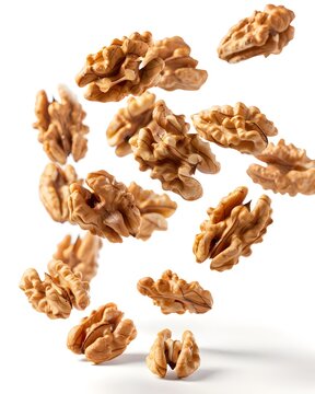 walnuts levitating healthy snack isolated on white background