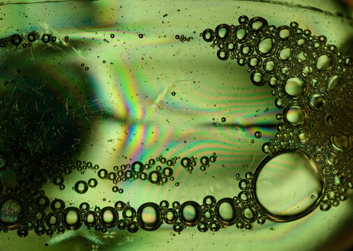 Plastic bottle polarized light creating colourful stress lines