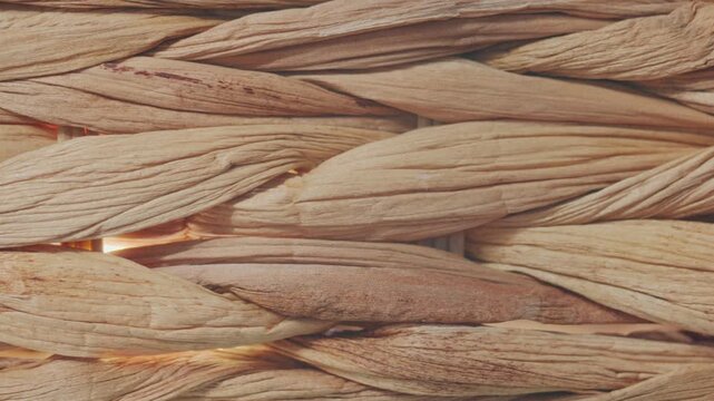 Beautifully lit macro video of a handmade wicker basket. Perfect for organic brand identity
