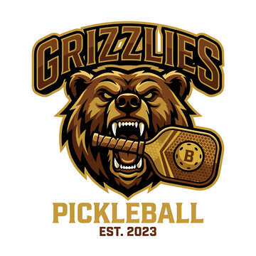 Grizzly bear holding pickleball paddle.