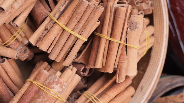 Cinnamon bundles create a warm, inviting market display