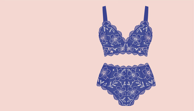 Beautiful blue lace female lingerie set consisting of a bra and high-waisted briefs decorated with floral pattern.