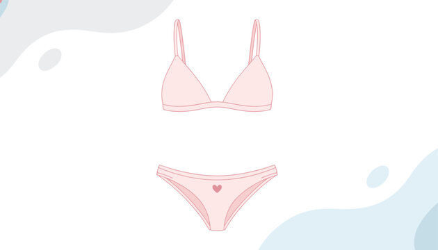 Two piece soft pink swimsuit bikini set with a tiny printed heart on the bottoms isolated on a soft pastel blue background.