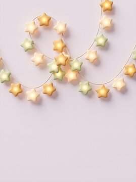 Star Shaped Glowing Fairy Lights on Soft Pink Background