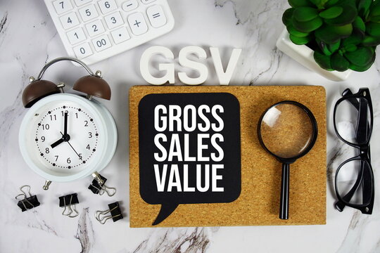 GSV - Gross Sales Value acronym with calculator, alarm clock and magnifying glass, Business concept background