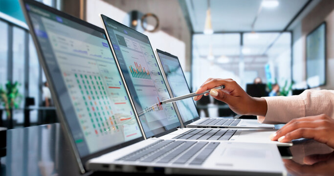 Young African American Woman Monitors IT Asset Inventory
