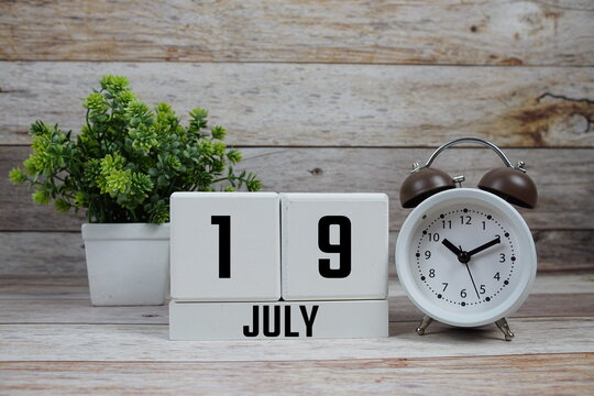 Wooden Calendar Showing the Date of July 19th. Day 19 of July month
