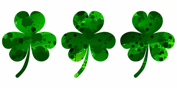 Three Green Clovers With Speckled Texture On White Background