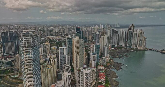 Panama City Aerial v9 cinematic drone fly along coastline across punta paitilla and pacifica neighborhoods capturing downtown cityscape with luxurious properties - Shot with Mavic 3 Cine - March 2022
