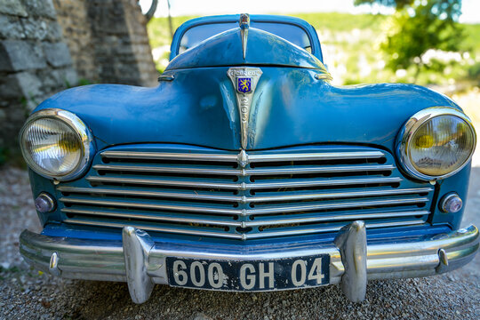 A classic blue Peugeot 203, built between 1948 and 1960 by the French automaker Peugeot in Sochaux. The 203 was Peugeot&rsquo;s first newly developed model after World War II.