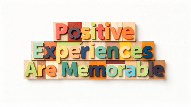 colorful wooden blocks spelling positive experiences are memorable in bright vivid tones and playful arrangements for motivational lifestyle themes