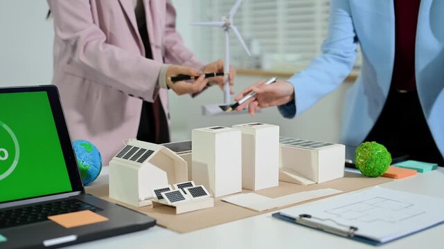 Business team working virtual modern smartphone to reduce CO2 emissions carbon footprint climate change to limit global warming.Sustainable development