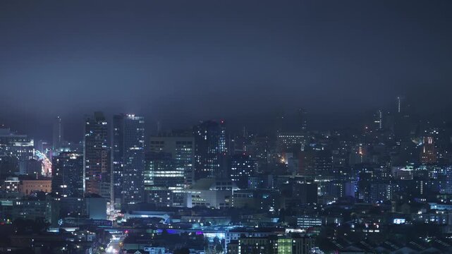 San Francisco Downtown Cityscape Telephoto Time Lapse at Night from Bernal Heights Pan L California USA