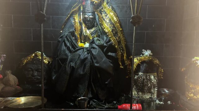 Maa Kali Idol Decorated for Evening Worship Inside Hindu Temple

