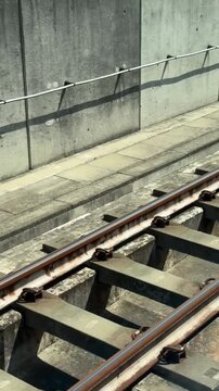 Train window view of MRT railway track in motion, moving rail transit footage