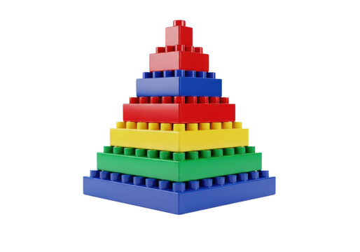precisely constructed pyramid tower of primary colored, glossy interlocking plastic bricks against an immaculate transparent studio background with soft reflections. concept of precision and