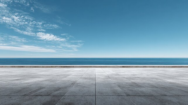 A vast empty stone terrace overlooking the blue ocean under a clear sky. Symbolizes freedom and new.