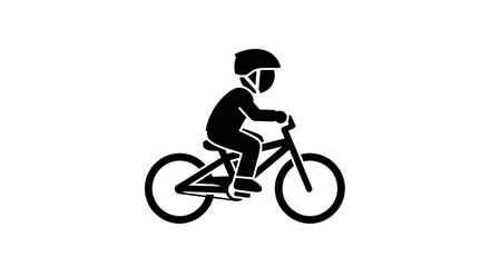 Obraz premium Silhouette of a young child riding a bicycle wearing a helmet.