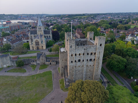 Rochester castle and cathedral at dawn aerial view towards Chatham. Quiet early morning in old town with historic landmarks. Rochester, UK, 23.05.2026