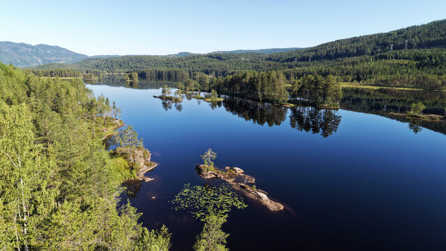 Lake reflections on a Norwegian lake, Buskerud, Norway