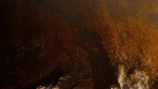 The surface of an alien planet. The ground appears rusty and uneven, with various textures creating an interesting landscape. The lighting gives a unique feel to the scene.