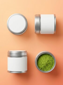 Four metal containers with white labels and green powder