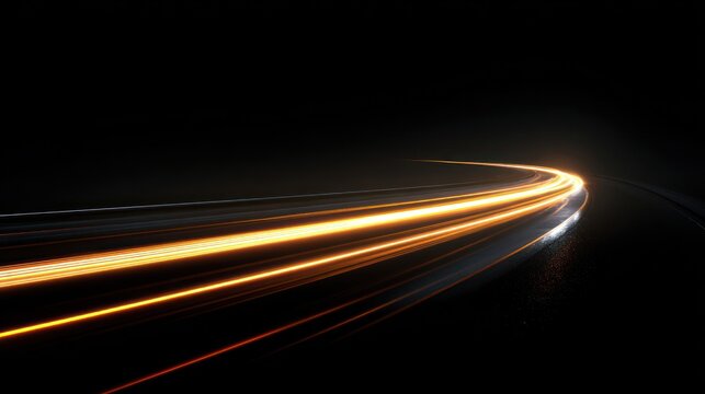 Car light trails on a dark road at night