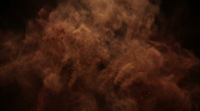 Orange smoke explosion in dark